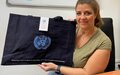 UNSCOL staff turn discarded uniforms into sustainable tote bags